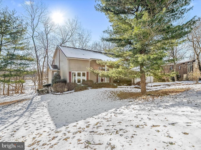 view of snow covered property