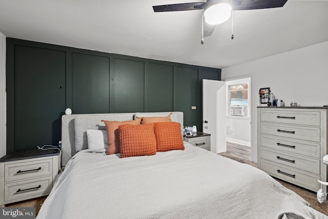 bedroom featuring ceiling fan and cooling unit