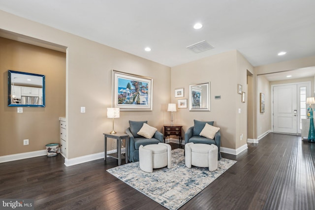 living room featuring dark wood-type flooring