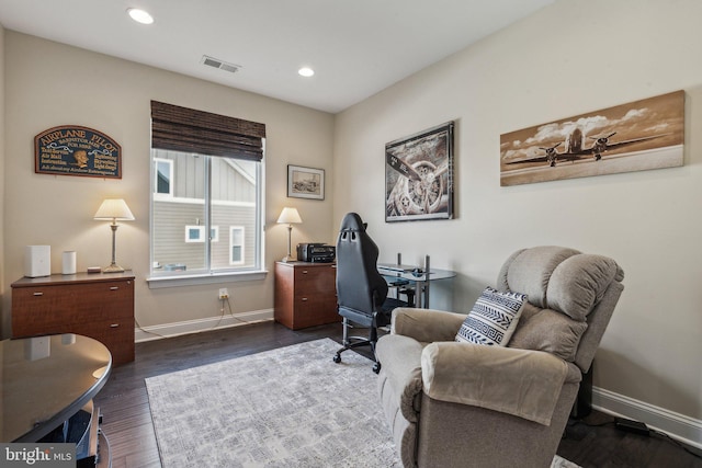 home office featuring dark hardwood / wood-style flooring