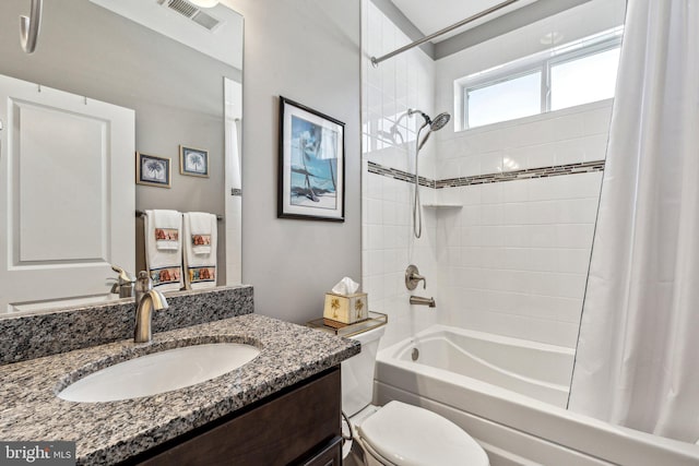 full bathroom with vanity, toilet, and shower / bathtub combination with curtain