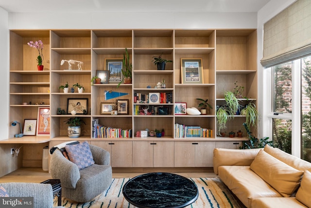 sitting room featuring light wood finished floors