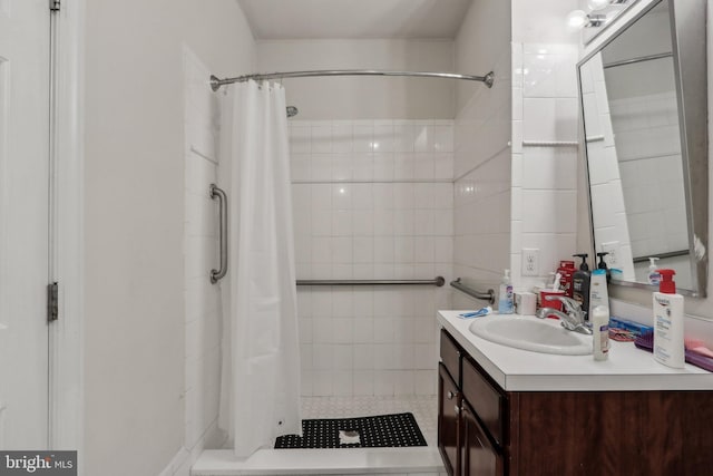 bathroom with vanity and a shower with shower curtain