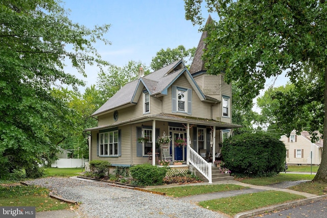 victorian-style house with a porch