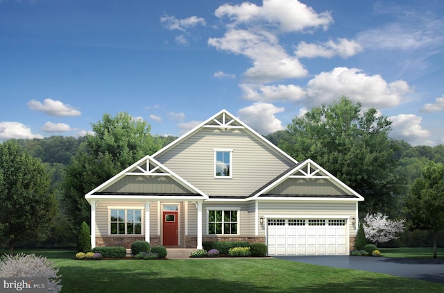 craftsman house featuring a garage and a front yard