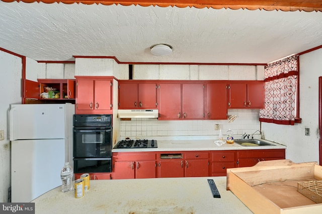 kitchen with black appliances and sink