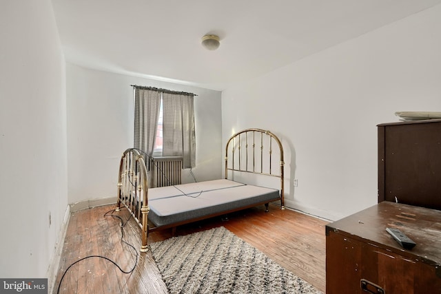 bedroom featuring light wood-type flooring