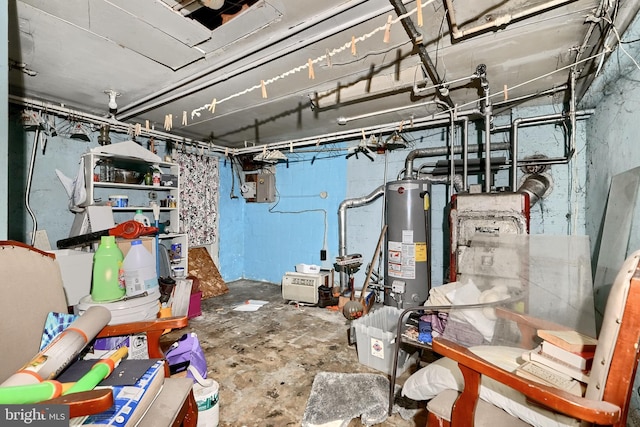 basement with electric panel and gas water heater