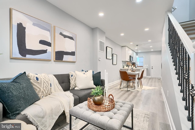 living room featuring light hardwood / wood-style floors