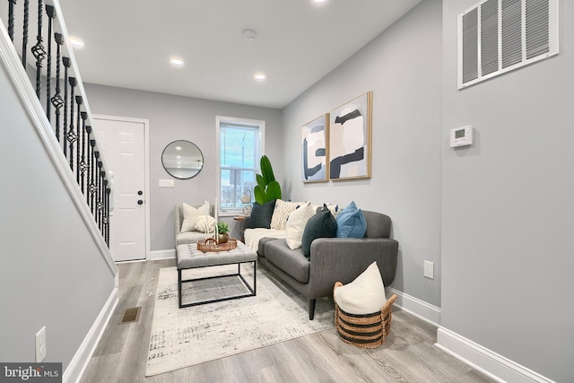 living room with hardwood / wood-style flooring