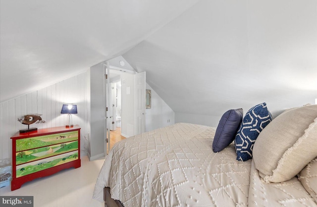 bedroom featuring vaulted ceiling