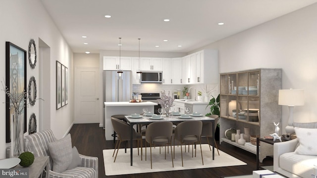 dining room featuring dark wood-type flooring and sink