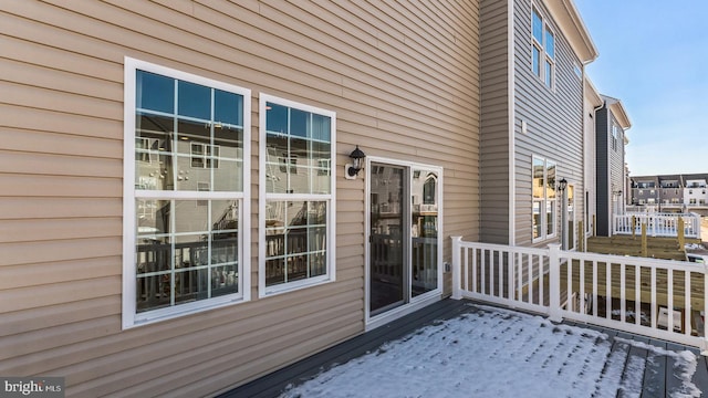 view of snow covered deck