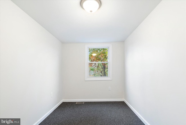 unfurnished room with carpet floors