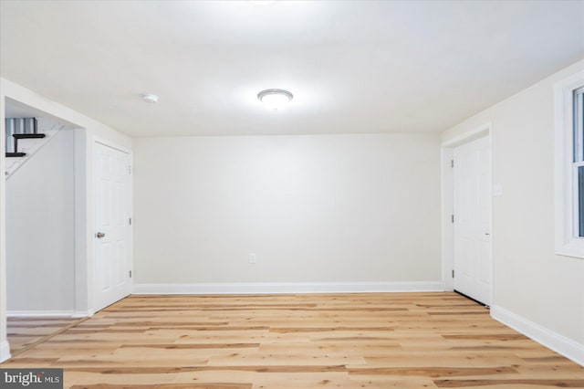 spare room featuring light wood-type flooring