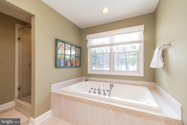 bathroom featuring shower with separate bathtub and tile patterned floors