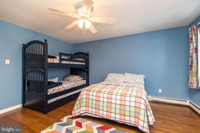 bedroom featuring dark hardwood / wood-style flooring and ceiling fan