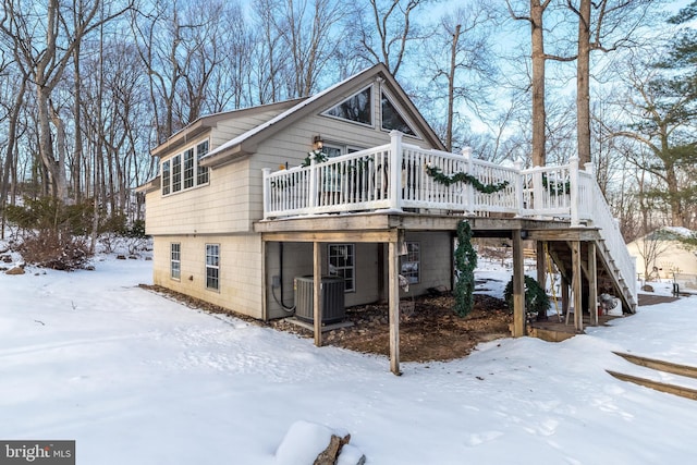 exterior space with a wooden deck and central air condition unit