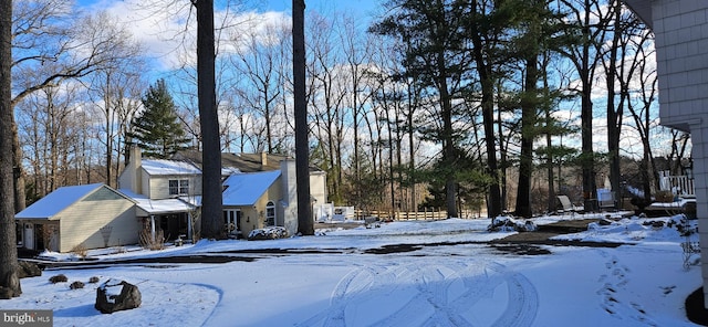 view of yard covered in snow