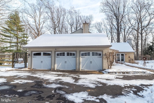 view of snow covered garage