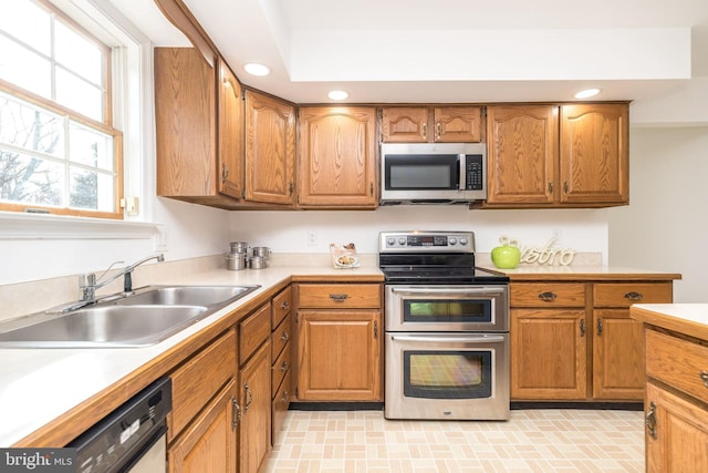 kitchen featuring appliances with stainless steel finishes and sink