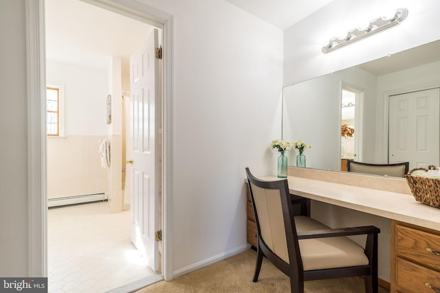 bathroom featuring baseboard heating