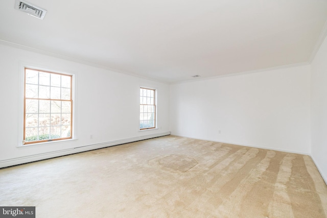 unfurnished room featuring ornamental molding, light carpet, and a baseboard radiator