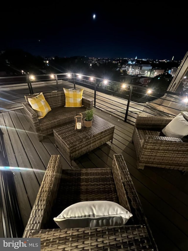 view of balcony at twilight