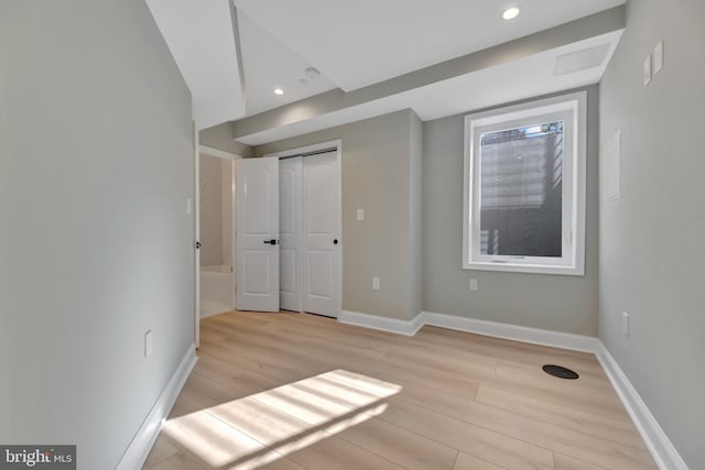 unfurnished bedroom with light hardwood / wood-style flooring