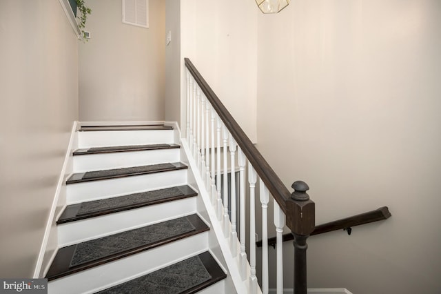 stairway with a high ceiling