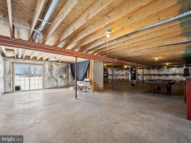 basement with heating unit and billiards