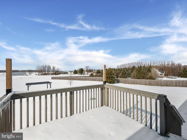 view of snow covered deck