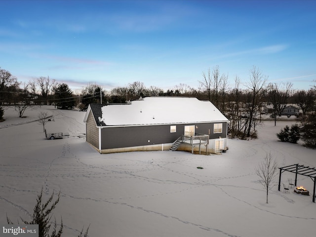 view of snow covered house