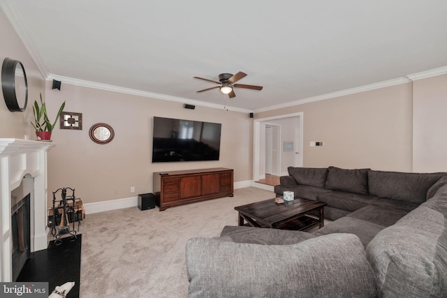 living room featuring ceiling fan, light colored carpet, and ornamental molding