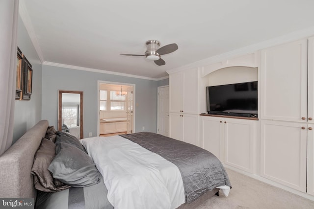 carpeted bedroom with ceiling fan, connected bathroom, and ornamental molding