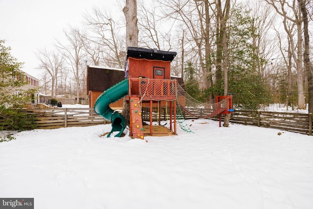 view of snow covered playground