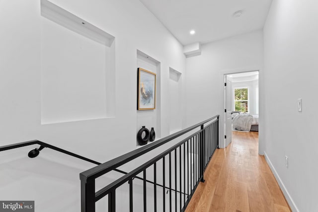 hallway with light wood-type flooring