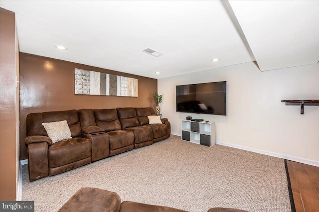 living room featuring recessed lighting, visible vents, and baseboards