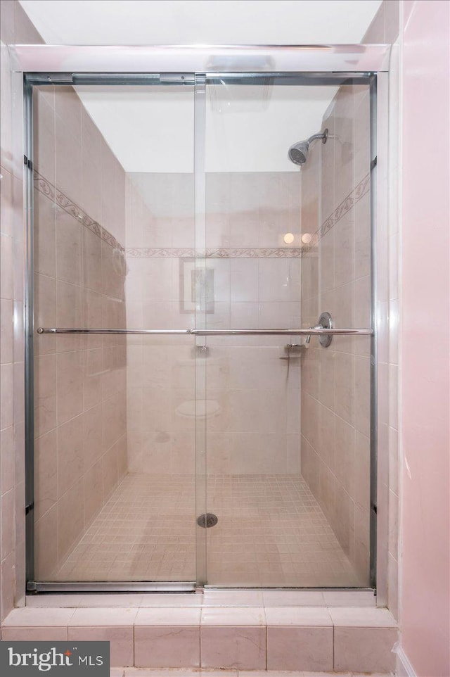 full bathroom with a stall shower