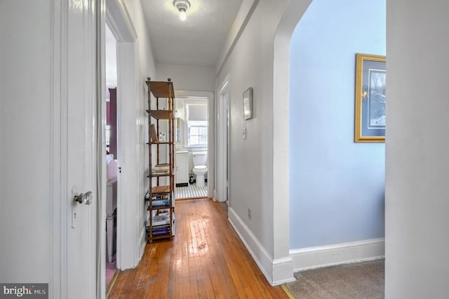 hall featuring wood-type flooring