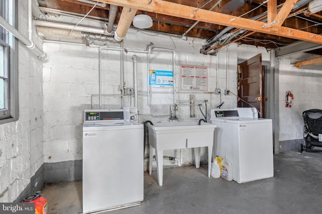 basement featuring washing machine and dryer