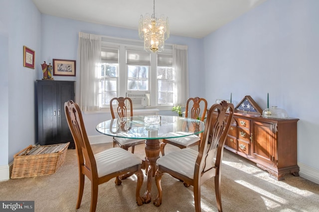 carpeted dining area with cooling unit and a chandelier