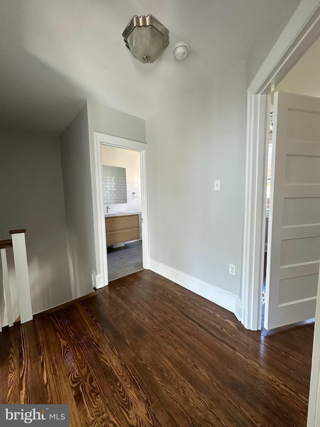 interior space with dark hardwood / wood-style floors