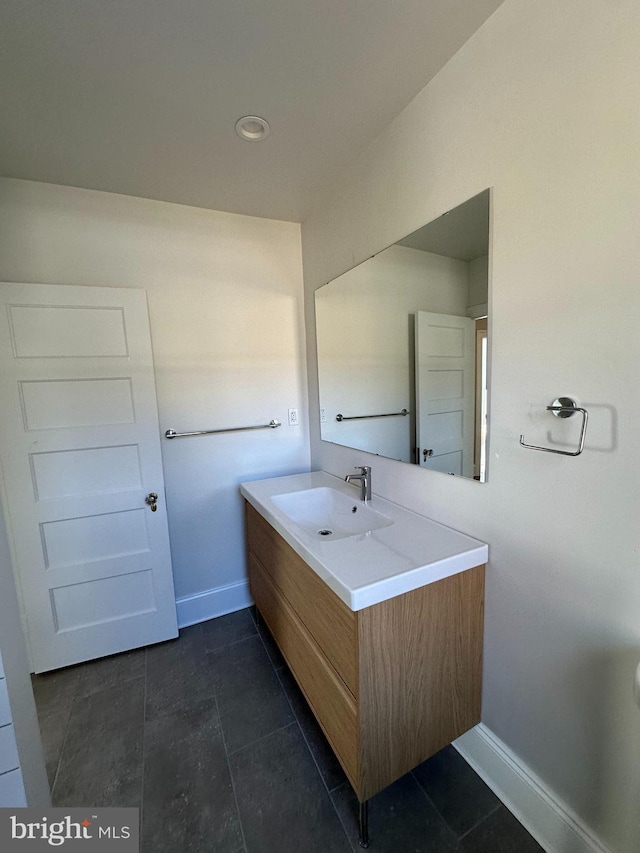 bathroom featuring tile patterned floors and vanity