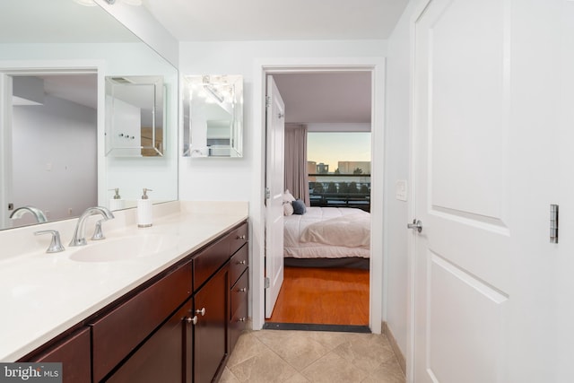 bathroom featuring tile patterned floors and vanity