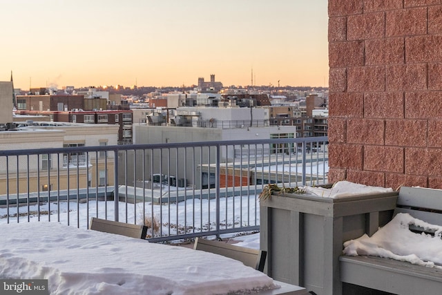 patio terrace at dusk with a balcony