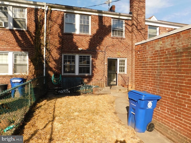 rear view of house with a patio