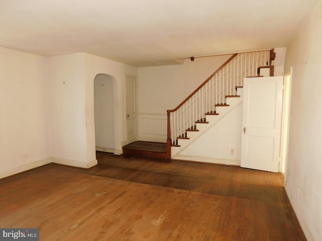 interior space with dark hardwood / wood-style flooring