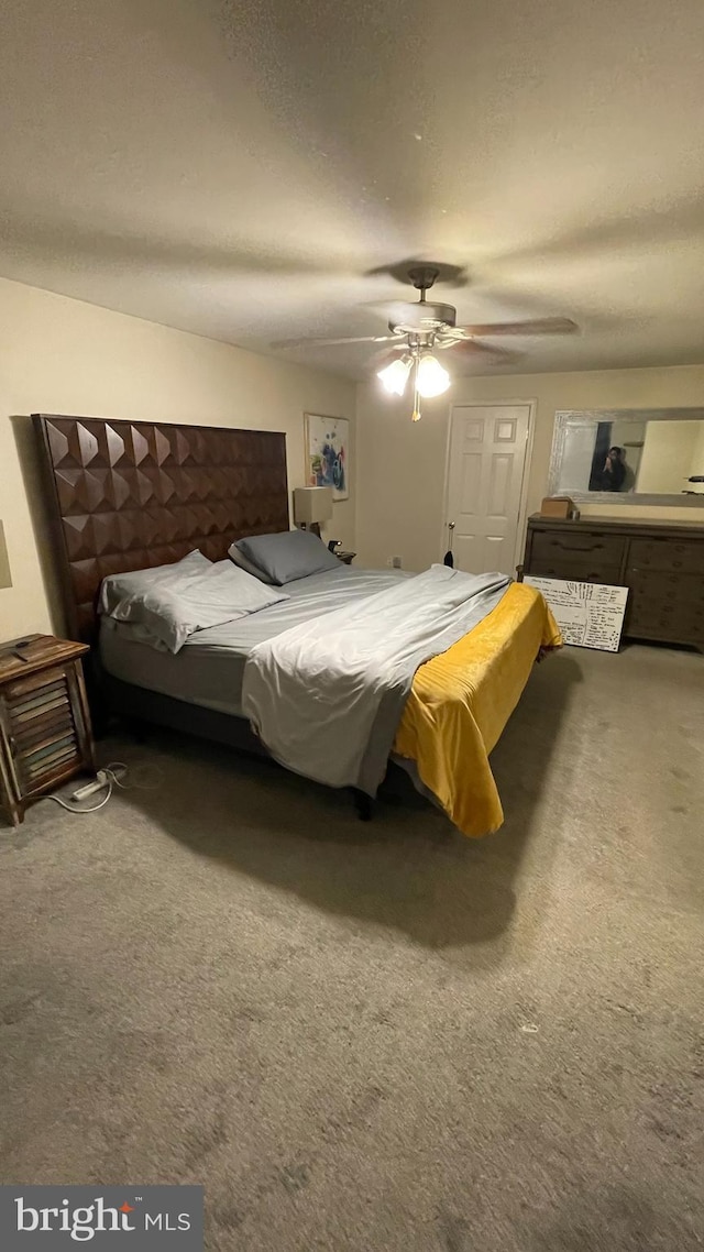 bedroom featuring carpet and ceiling fan