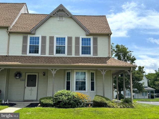 view of front of home with a front yard